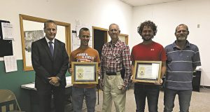 Area PennDOT Interns Honored For Heroism Jim Foringer (from left), Jacob Southwick, James Garfield, Nick Swatzler and Chad Tarr come together to honor the two interns who sprang into action and helped Garfield to safety.